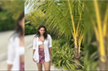 Triptii Dimri breezes through her beach holiday in a printed skirt and white shirt